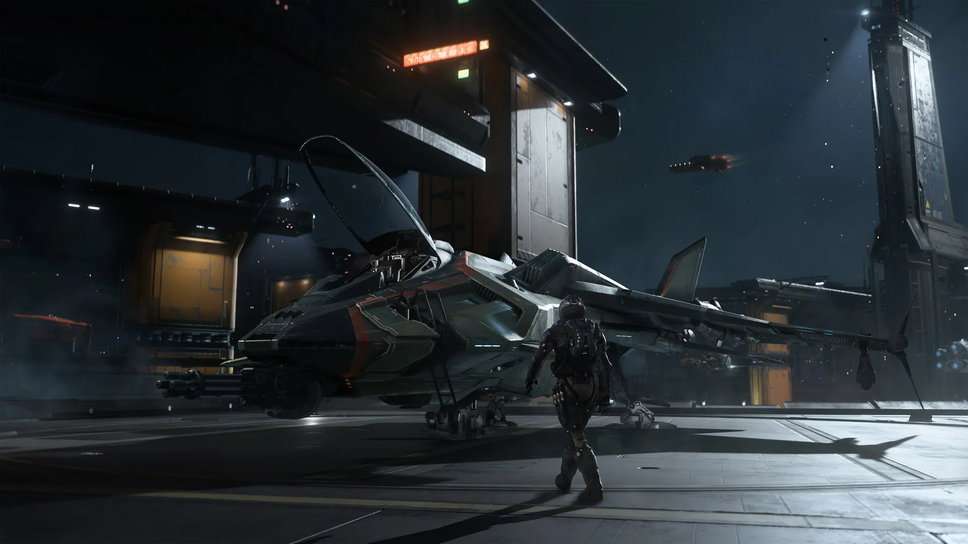 Official Steam screenshot: a pilot walks toward a fighter with an open canopy on a night hangar deck